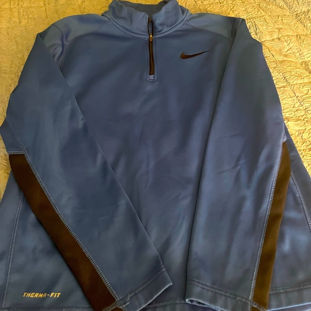 Nike Men's Blue Thermal 1/4 zip jacket.  Dri-Fit material men’s medium